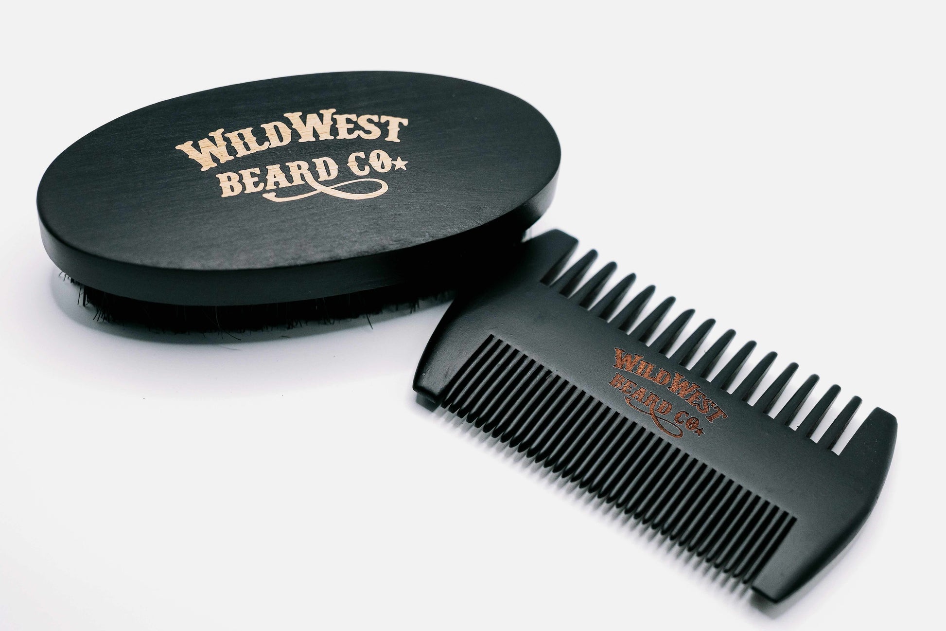 Picture of Wild West Beard Co.'s boars hair beard brush and pear wood beard comb