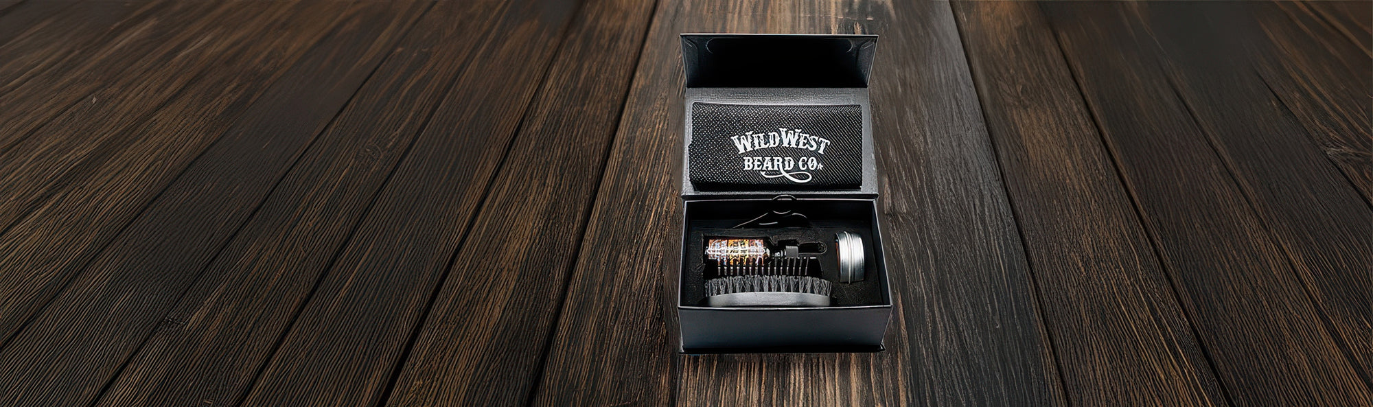 Cigarette case with accessories on a wooden surface